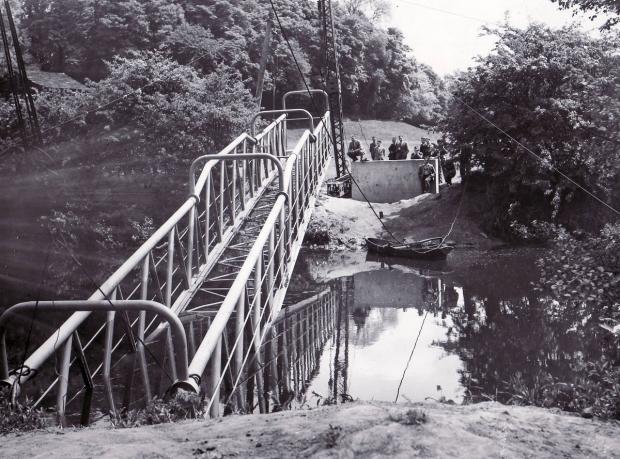 Bradford Telegraph and Argus: Bridge swinging at Myrtle Park, Bingley, in 1951